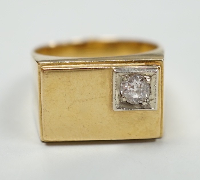 A 750 yellow metal and single stone diamond set signet ring, size Q/R, gross weight 10 grams.